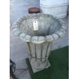 FLUTED URN ON PLINTH