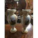 PAIR OF CERAMIC URNS WITH GUILT DECORATION AND PAINTED SCENES OF PHEASANTS