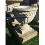 SMALL URN ON PLINTH