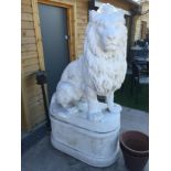 PAIR OF LARGE LIONS ON PLINTHS