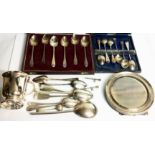 TWO CASED EARLY 20TH CENTURY SETS OF SIX SILVER TEASPOONS Including one set with embossed motifs