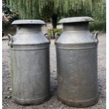 A PAIR OF ALUMINIUM MILK CHURNS. (70cm)