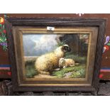 A FRAMED OIL PAINTING OF SHEEP IN A ROCKY LANDSCAPE