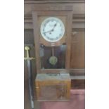 GLEDHILL BROOK OAK CASE CLOCKING IN CLOCK