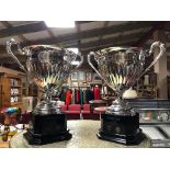PAIR OF LARGE SILVER EFFECT TROPHIES AND BLACK WOODEN BASE, MGF CUP WINNER SILVERSTONE