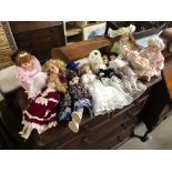 BOX OF ASSORTED PORCELAIN DOLLS X 12