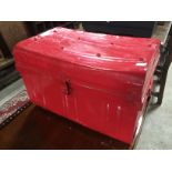 RED METAL TRAVELLING TRUNK