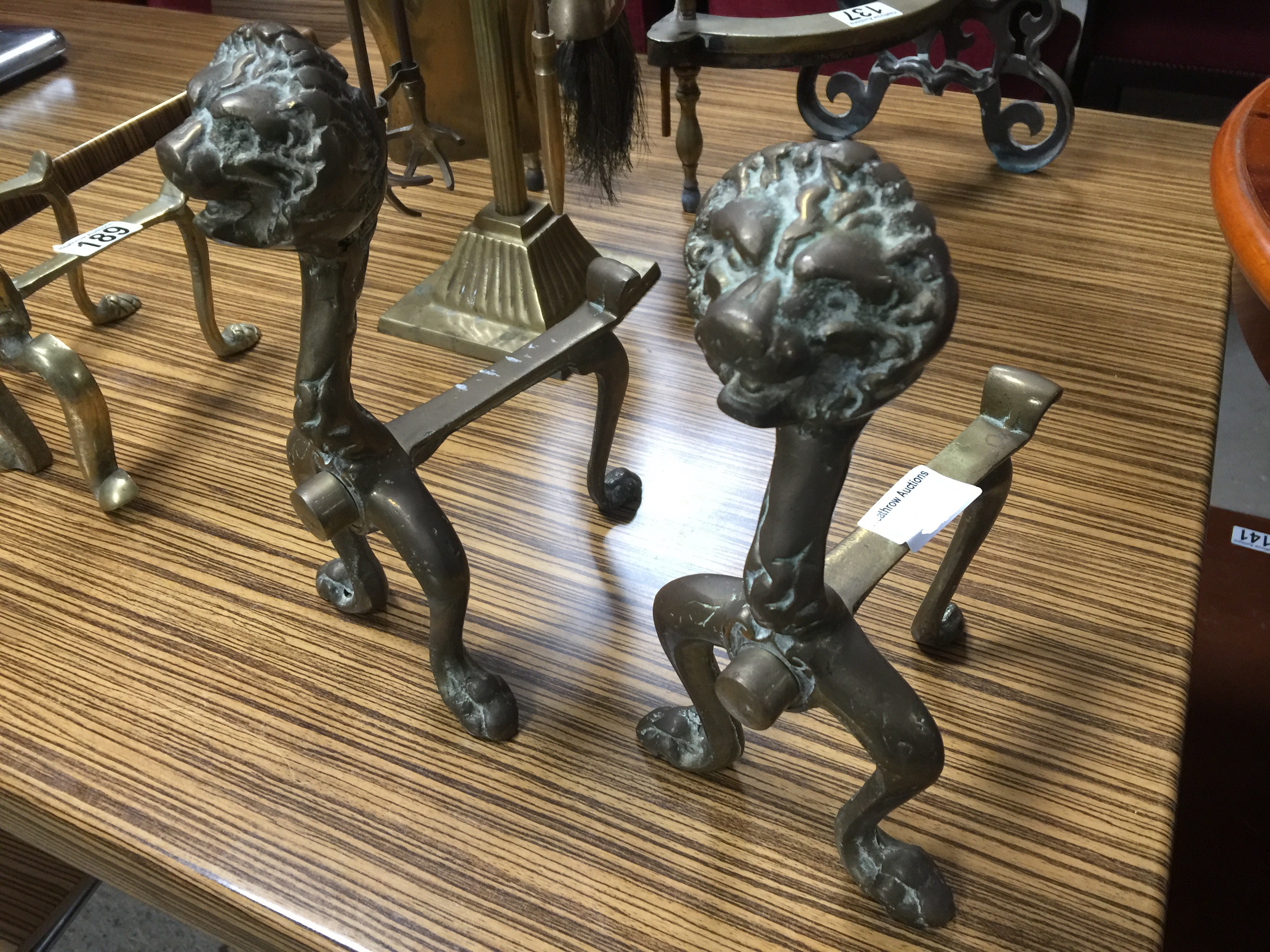 PAIR OF BRONZE LION FIRE DOGS