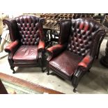 PAIR OF RED UPHOLSTERED CHESTERFIELD WING BACK QUEEN ANNE STYLE ARMCHAIRS H X 105CM D X 71CM W X