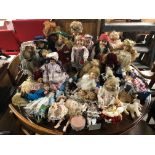 LARGE COLLECTION OF ASSORTED COLLECTIBLE PORCELAIN DOLLS IN DRESS WITH VARIOUS ACCESSORIES