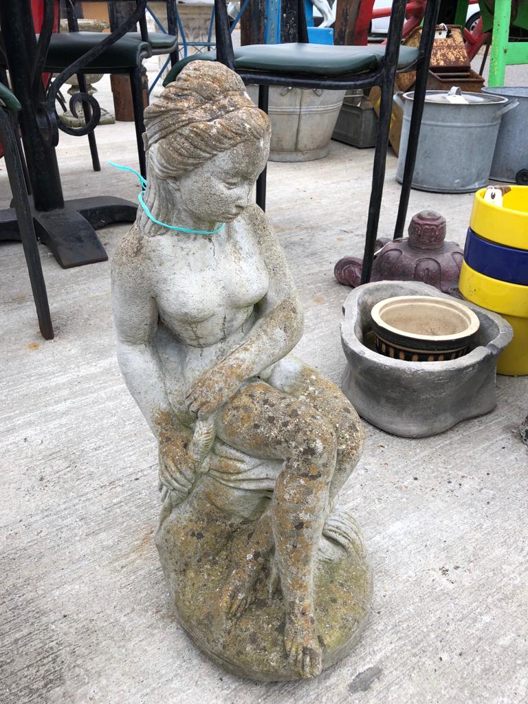 STATUE OF LADY SITTING