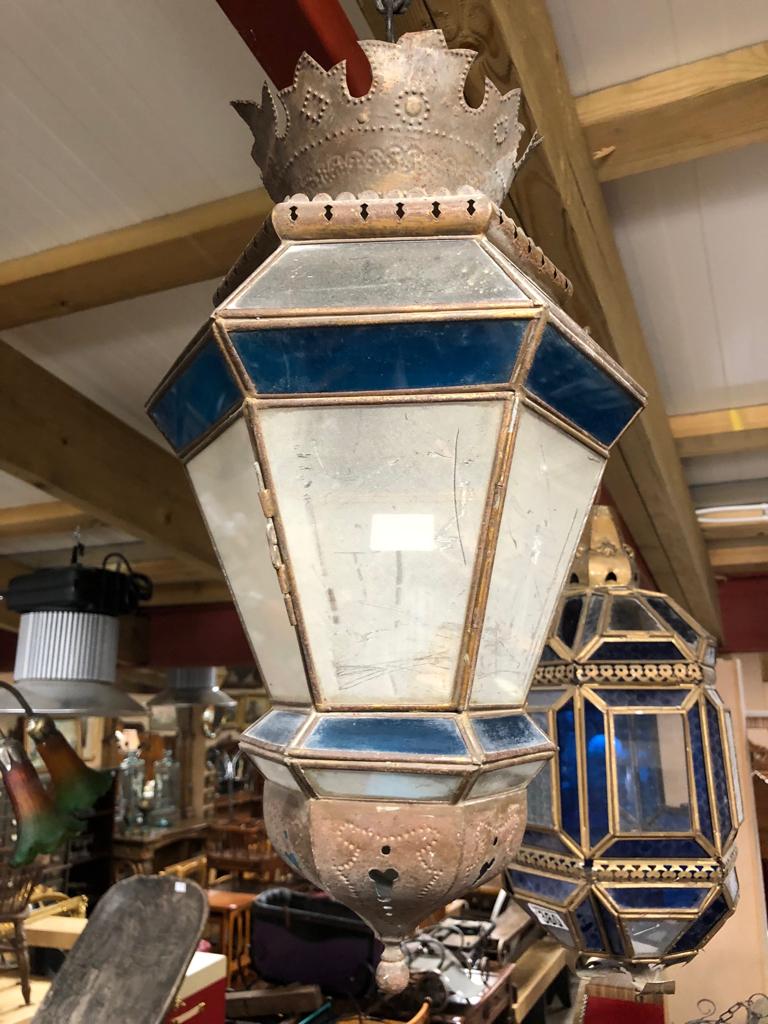 VINTAGE MOROCCON HEXAGONAL LANTERN WITH DECORATIVE EMBOSSED METAL WORK AND COLOURED AND CLEAR