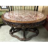 LARGE CIRCULAR TURN OF THE CENTURY CHINESE RED ONYX TABLE Structurally the stand is solid and sturdy
