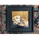 AN EBONIZED FRAMED PORTRAIT OF A DOG