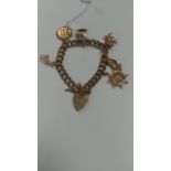 9CT GOLD CHARM BRACELET AND CHARMS WEIGHT 25.4G
