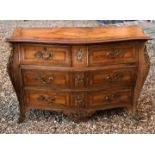 AN 18TH CENTURY DESIGN FRENCH KINGWOOD AND WALNUT BOMBE CHEST With two short above two long drawers,