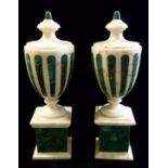 A PAIR OF ITALIAN MARBLE URNS The classical shape white marble inlaid with green malachite flutes,