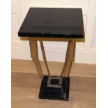 AN ART DECO DESIGN CHROME AND EBONIZED WOOD PEDESTAL STAND The square top on geometric supports