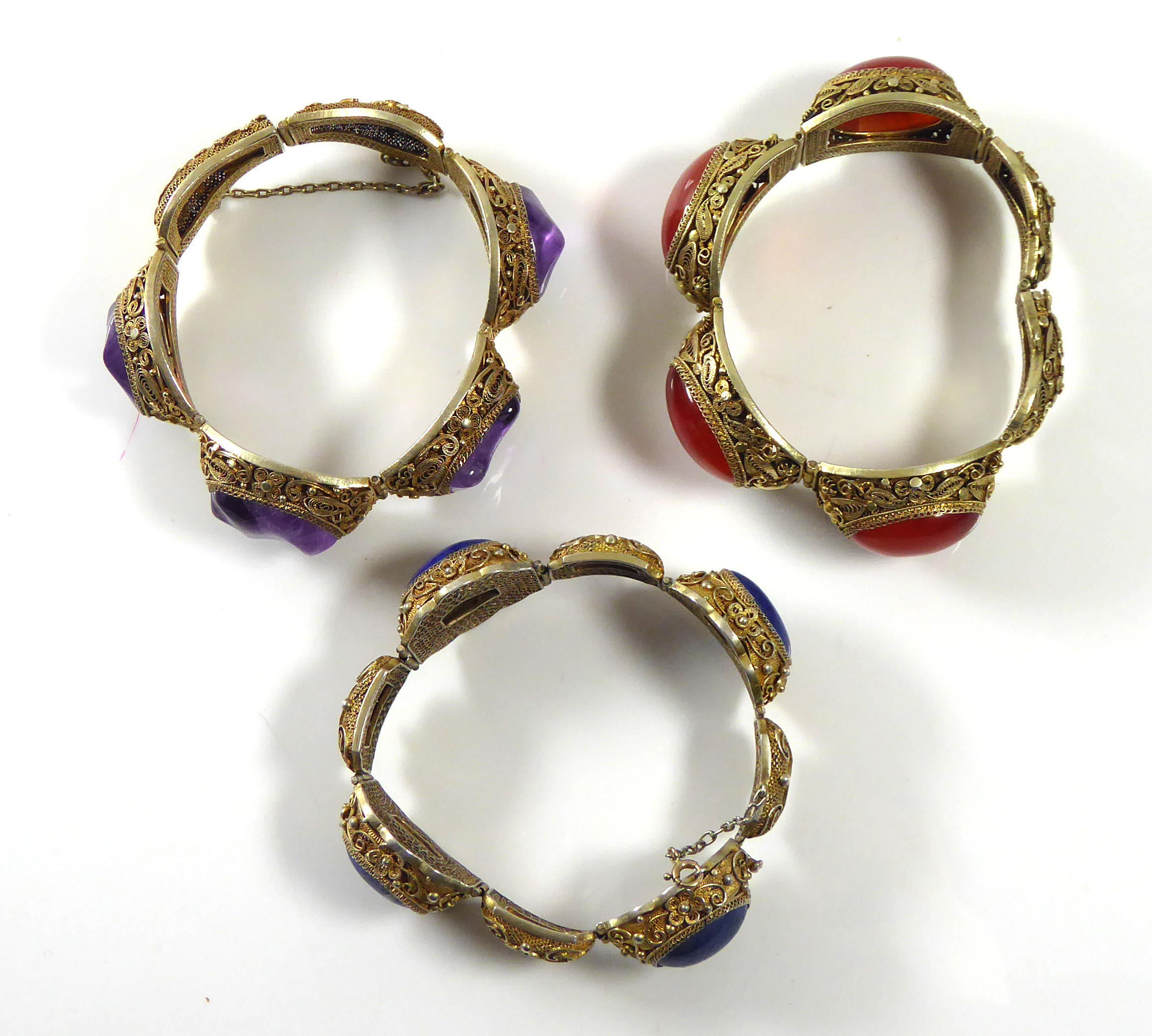 A COLLECTION OF THREE VINTAGE CHINESE SILVER GILT AND GEM SET BRACELETS Having amethyst, amber and - Image 2 of 6