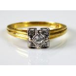 A VINTAGE 18CT GOLD AND DIAMOND CLUSTER RING Having a central round cut diamond set with diamonds to