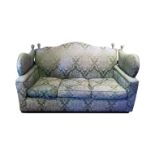 AN EARLY/MID 20TH CENTURY CAMEL-BACK KNOLE SETTEE Upholstered in a floral fabric, with drop ends