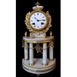 A 19TH CENTURY FRENCH WHITE MARBLE AND ORMOLU PORTICO MANTLE CLOCK The circular white dial held in