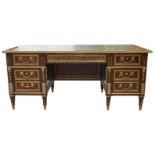 MANNER OF GUILLAUME BENNEMAN, A MID 20TH CENTURY FRENCH ORMOLU MOUNTED MAHOGANY BUREAU-A-CAISSONS