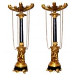 A FINE PAIR OF 19TH CENTURY FRENCH EMPIRE GILT BRONZE FIVE BRANCH CANDELABRAS The sconces of oil