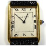 ASPREY, A VINTAGE 18CT GOLD GENT'S WRISTWATCH The rectangular dial with sapphire set winder,