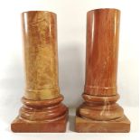 A PAIR OF CLASSICAL ITALIAN ROUGE MARBLE COLUMNS Cylindrical form, on square bases. (approx 23cm)