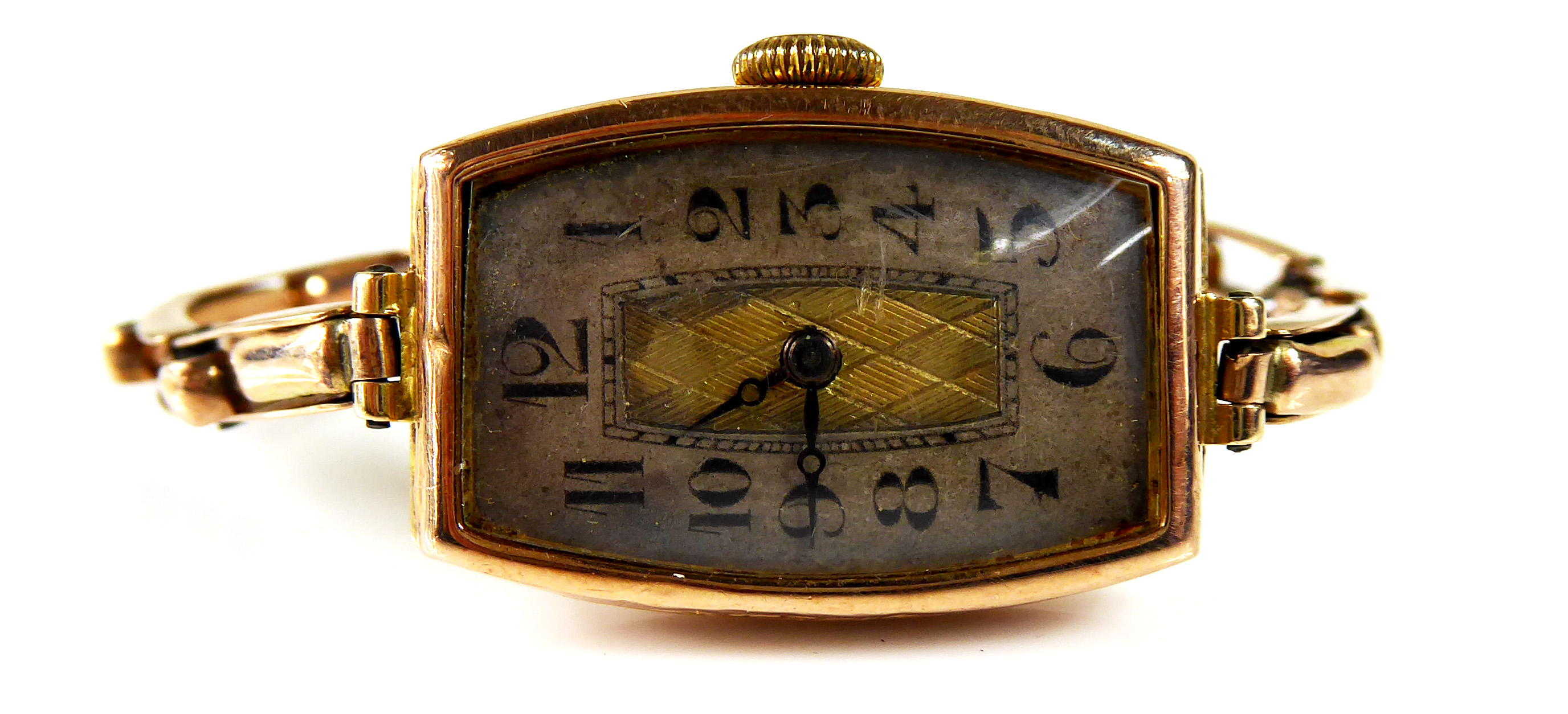 AN EARLY 20TH CENTURY 9CT GOLD LADIES' WRISTWATCH Geometric dial with Arabic numerals and expandable