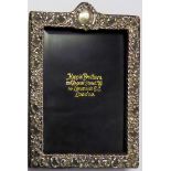 MAPPIN & WEBB, A VICTORIAN RECTANGULAR EASLE PHOTOGRAPH FRAME With scrolled decoration, hallmarked