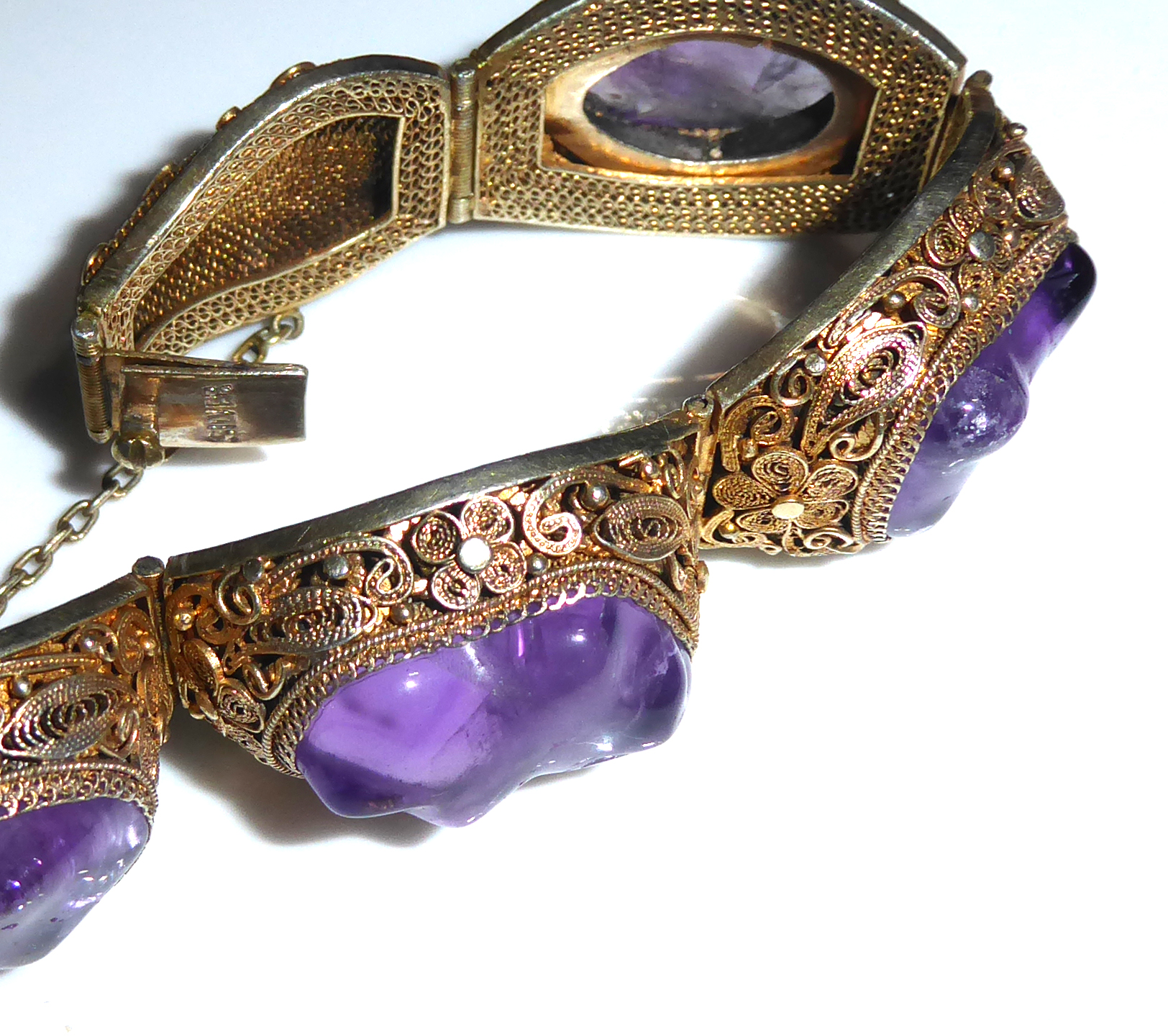 A COLLECTION OF THREE VINTAGE CHINESE SILVER GILT AND GEM SET BRACELETS Having amethyst, amber and - Image 6 of 6