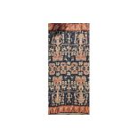 AN EARLY 20TH CENTURY INDONESIAN IKAT WOOLLEN TAPESTRY WALL HANGING Woven with oversized figures and