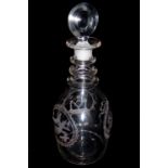 AN EARLY 19TH CENTURY DECANTER Of tapering shouldered form with triple ring neck and bullseye