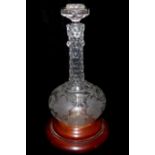 A MID 19TH CENTURY PRESENTATION DECANTER AND STOPPER Of unusual type with facet cut slender neck and