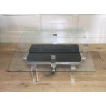 A 20TH CENTURY LUCITE, CHROME AND GLASS COFFEE TABLE Having a chrome and black perspex rectangular