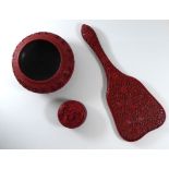 A COLLECTION OF EARLY 20TH CENTURY CHINESE CINNABAR ITEMS Hand mirror with fine carved floral
