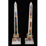 A PAIR OF ITALIAN TAPERING PYRAMID SPECIMEN MARBLE OBELISKS The white marble inlaid on all four