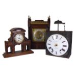 A LATE 19TH/EARLY 20TH CENTURY GERMAN OAK MANTLE CLOCK Having a pierced brass gallery finial and