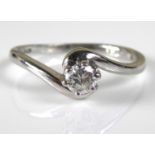 AN 18CT WHITE GOLD AND DIAMOND SOLITAIRE RING Having a single round cut diamond held in a twist