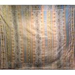 AN EARLY/MID 20TH CENTURY MIDDLE EASTERN COTTON AND GILT THREAD THROW Embroidered with script. (