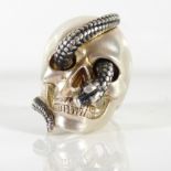 THEO FENNELL, A SILVER 'SKULL AND SNAKE' RING Stamped with maker's monogram (size R).