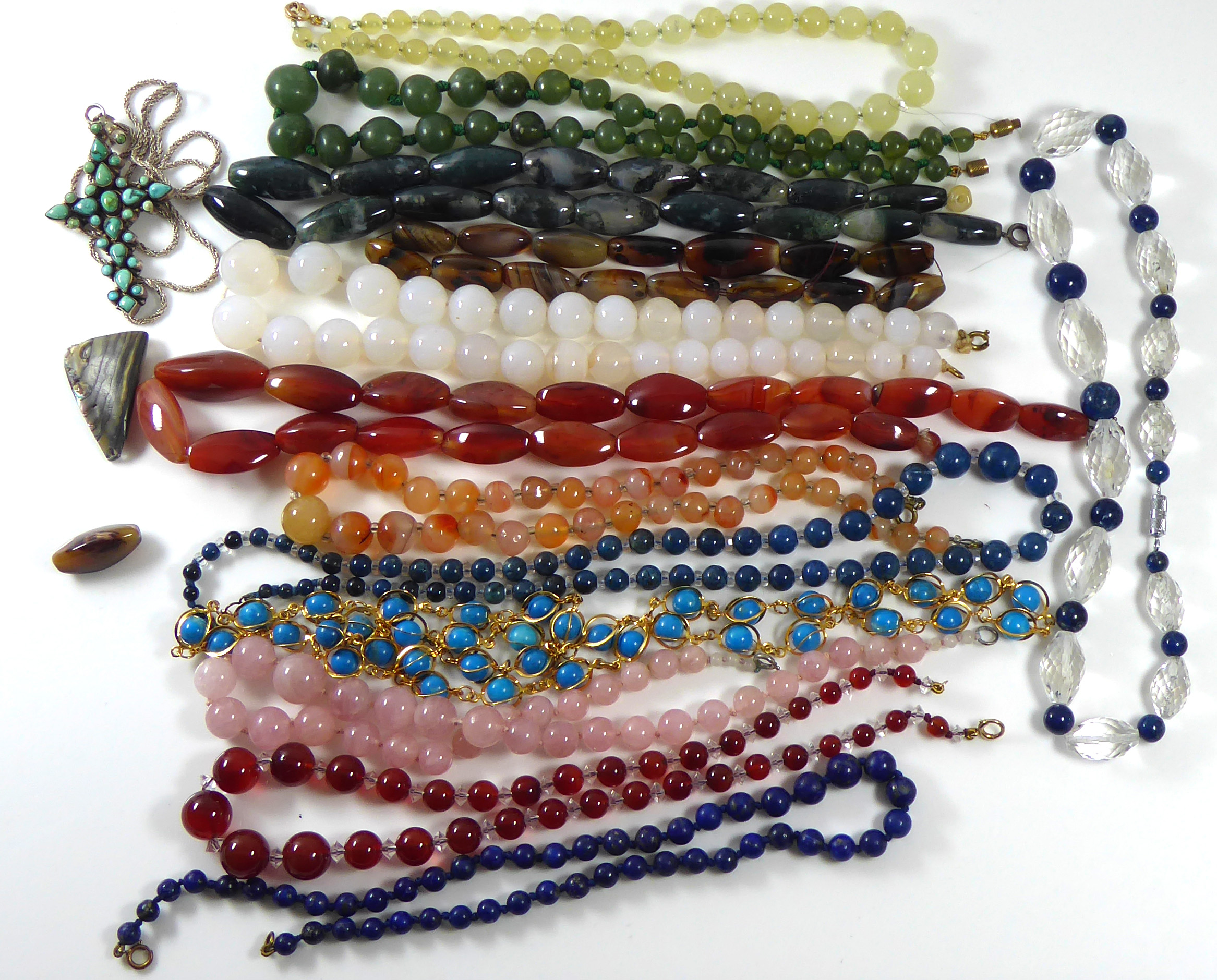 A COLLECTION OF VINTAGE AGATE BEAD NECKLACES Tapering spherical shape beads, together with a lapis