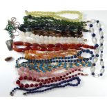 A COLLECTION OF VINTAGE AGATE BEAD NECKLACES Tapering spherical shape beads, together with a lapis