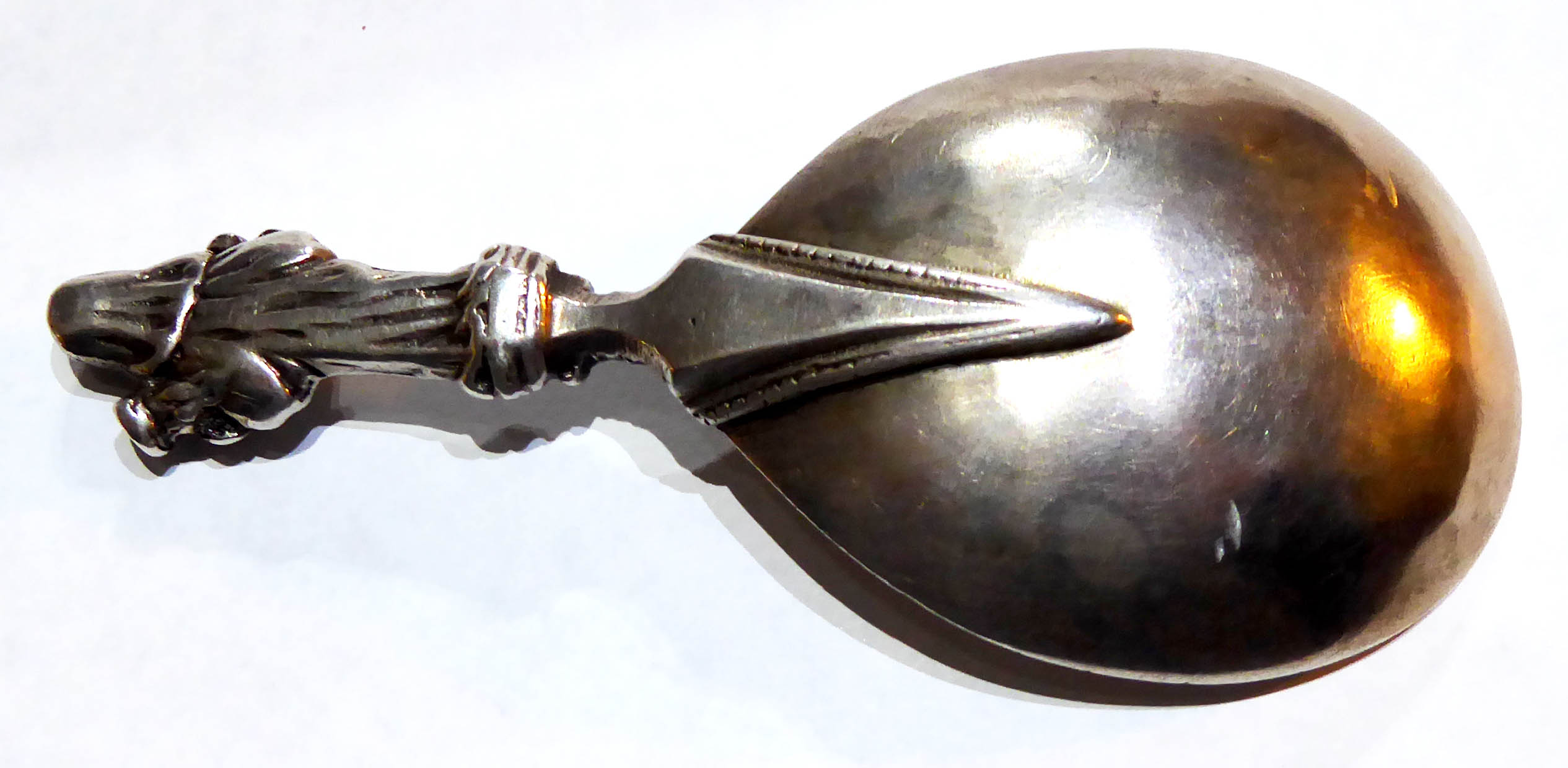 A LATE 17TH/EARLY 18TH CENTURY WHITE METAL ANOINTING SPOON Having a figural finial representing - Image 2 of 2