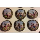 A SET OF SIX 19TH CENTURY BRASS AND ENAMEL CIRCULAR BUTTONS Each enamelled with figures in a garden,