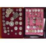 TWO SETS OF SIX VICTORIAN SILVER BUTTONS The circular form with Art Nouveau embossed designs,