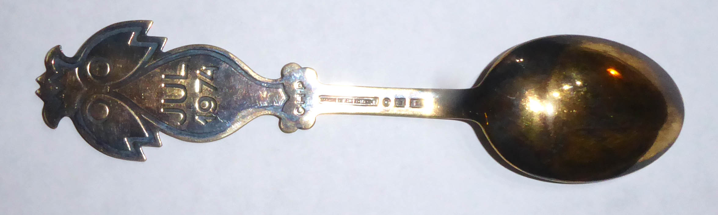 A. MICHELSON, DENMARK, A 20TH CENTURY SILVER AND ENAMEL SPOON Enamelled with a stylized bird with - Image 2 of 2