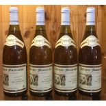 FOUR BOTTLES OF VINTAGE 1988 PULIGNY MONTRACHET WHITE WINE Cream label marked 'Caves Reunies de Couv